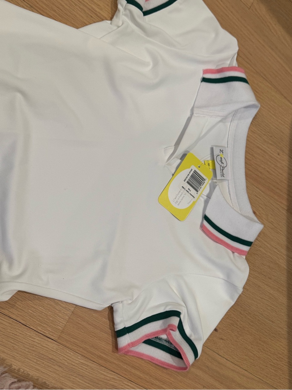 L’oeul Poché Women’s White Short Sleeve Tennis Polo with Pink & Green Trim
